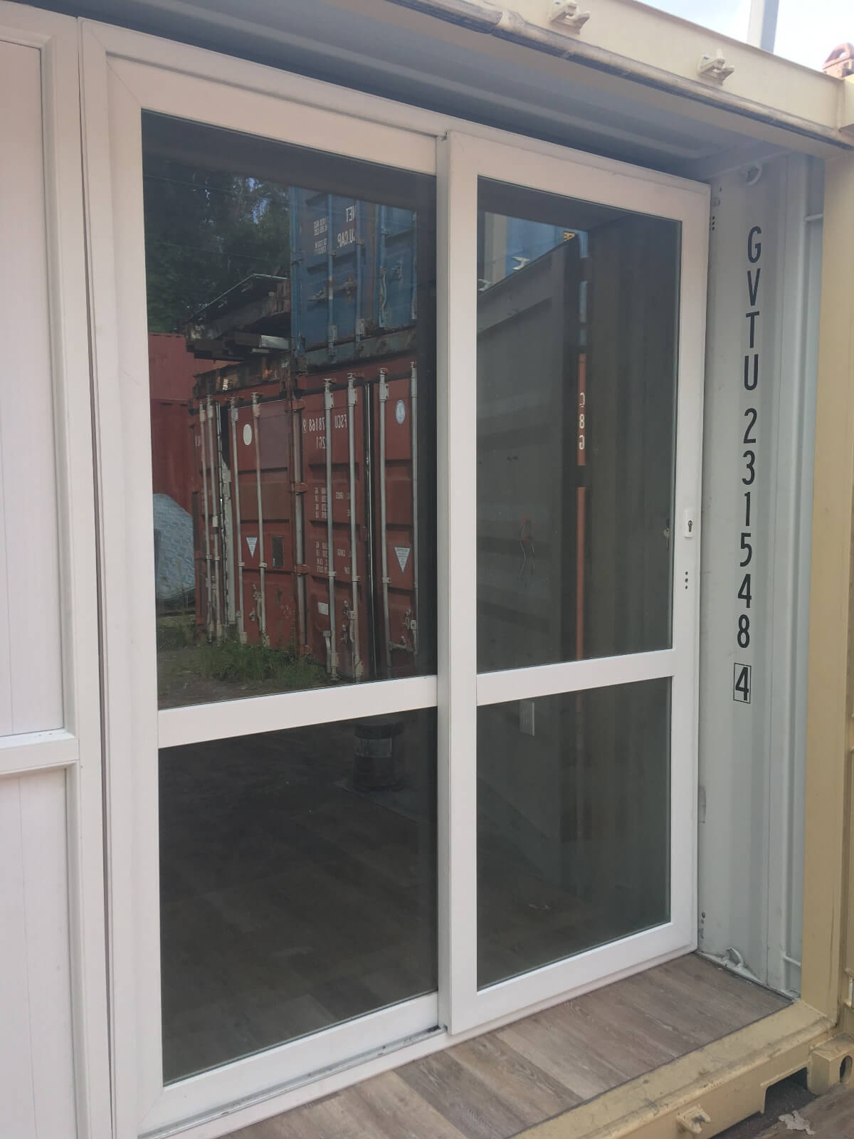 Shipping Container Sliding Glass Door - Container Modifications - CMG