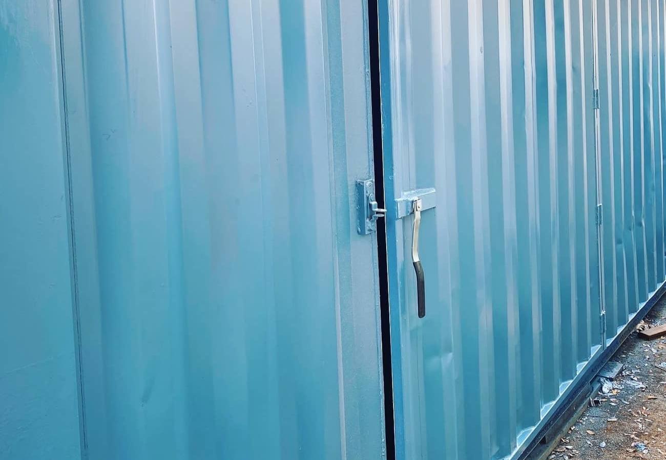 Blue shipping container barn door